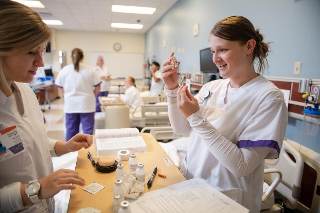 nursing students in a lab